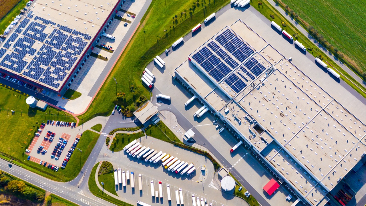 Aerial view of large industrial buildings and logistics operations